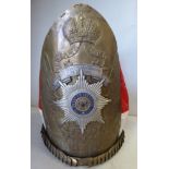 A reproduction of an Imperial Russian Mitre cap with an embossed metal plate and badge
