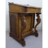 A late Victorian burr walnut veneered Davenport, the sloping,