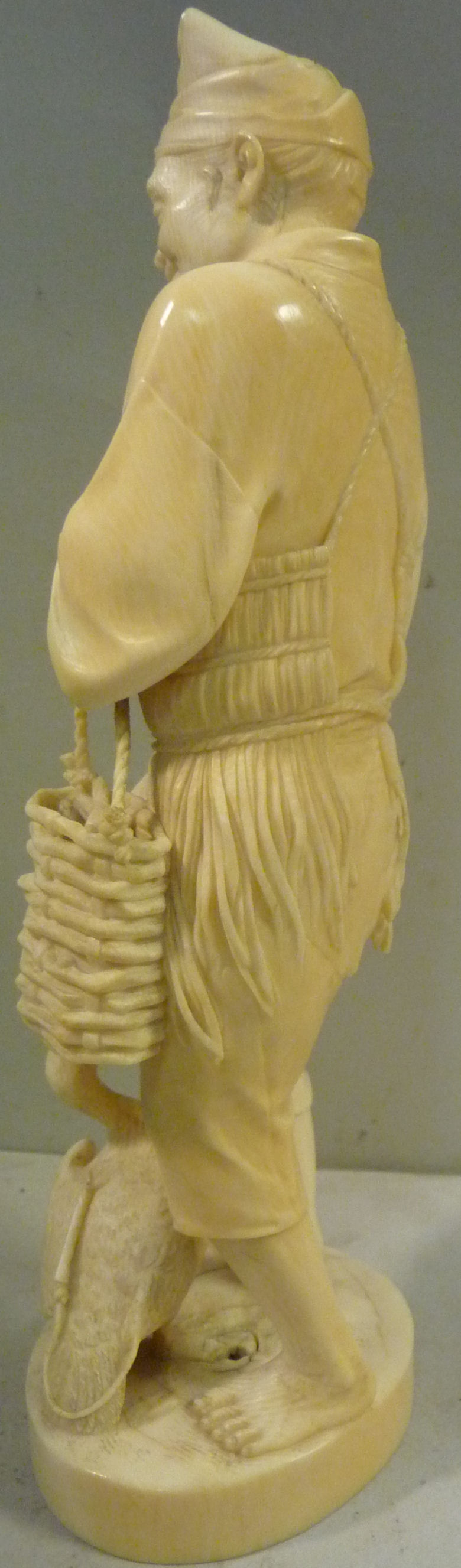 A 19thC Japanese carved ivory standing figure, - Image 2 of 8