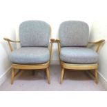 A pair of Ercol pale coloured beech, low hoop and spindled back,