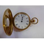 A lady's 18ct gold case half hunter pocket watch with engine turned decoration and enamelled blue