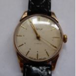 An Asprey 9ct gold cased wristwatch, faced by a baton dial,