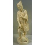 A 19thC Japanese carved ivory standing figure,