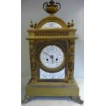 A late 19thC lacquered brass cased mantel clock with blue painted porcelain panels,