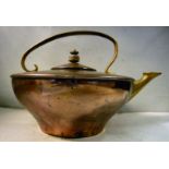 An early 20thC WAS Benson copper and brass kettle of wide, circular bowl design with a lid,