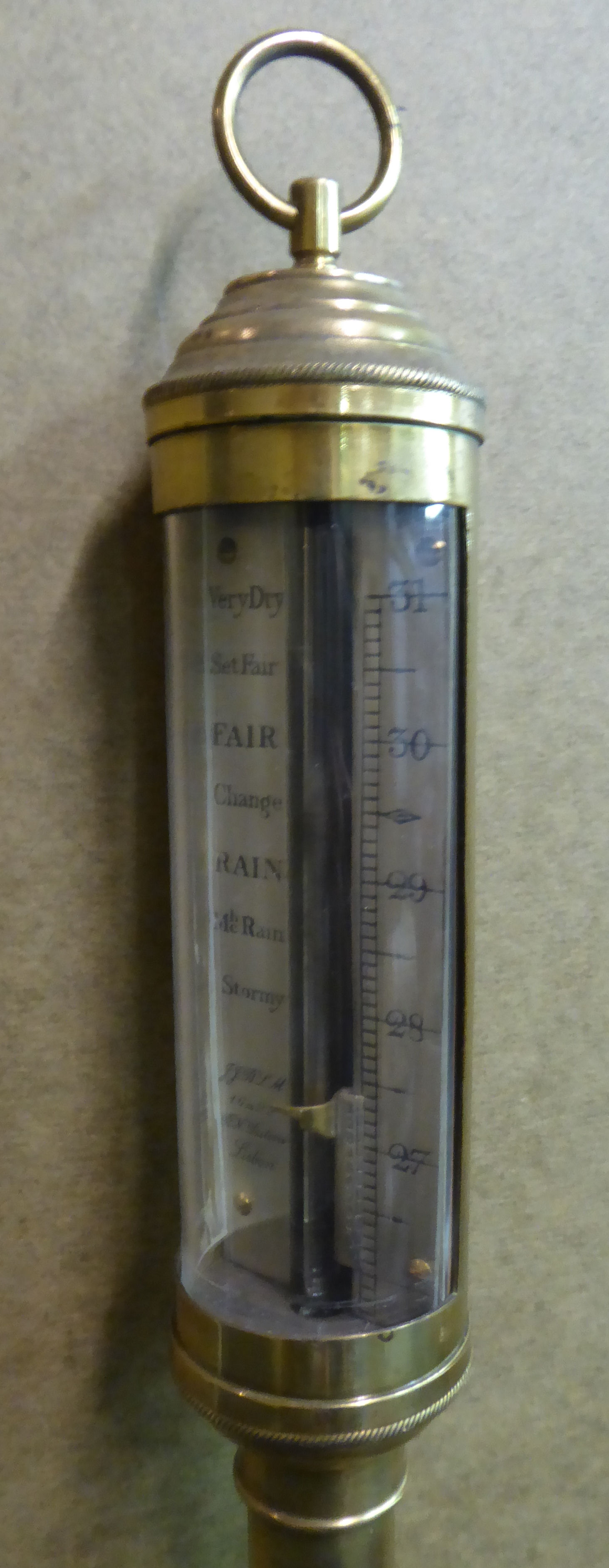 An early 20thC lacquered brass cased marine barometer with engraved, silvered steel register plates, - Image 2 of 4