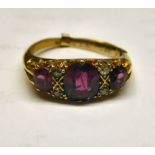 A Victorian 18ct gold claw set ruby and diamond ring