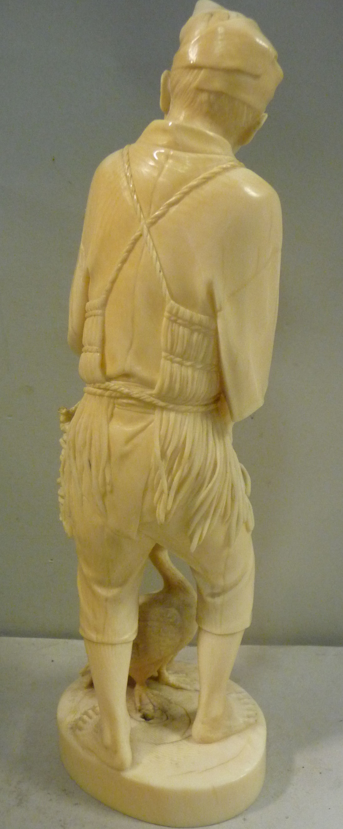 A 19thC Japanese carved ivory standing figure, - Image 3 of 8