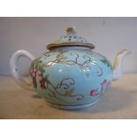 A late 19thC Chinese porcelain 'small' teapot of squat, bulbous form with an S-shaped spout,