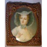 A late 19thC portrait miniature, a woman wearing a bonnet and dress watercolour on ivory 3.