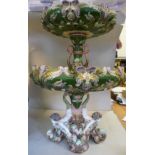 A late 19thC Continental majolica two-tier centrepiece, fashioned as a fountain,