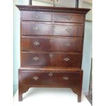 A late 18thC mahogany chest-on-chest, the upper part with a dentil moulded cornice,