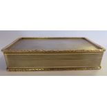 A silver and parcel gilt rectangular snuff box with engine turned and cast border ornament,