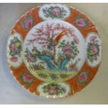 A mid 19thC Chinese porcelain dish, decorated in famille rose with two exotic birds,