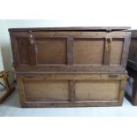 Two similar pine framed and plywood panelled trunks with hinged lids each 13''h 36''w BSR