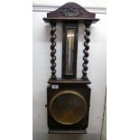 A 1920s oak cased barometer,