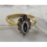 A 9ct gold sapphire and diamond set marquise shaped cluster ring 11