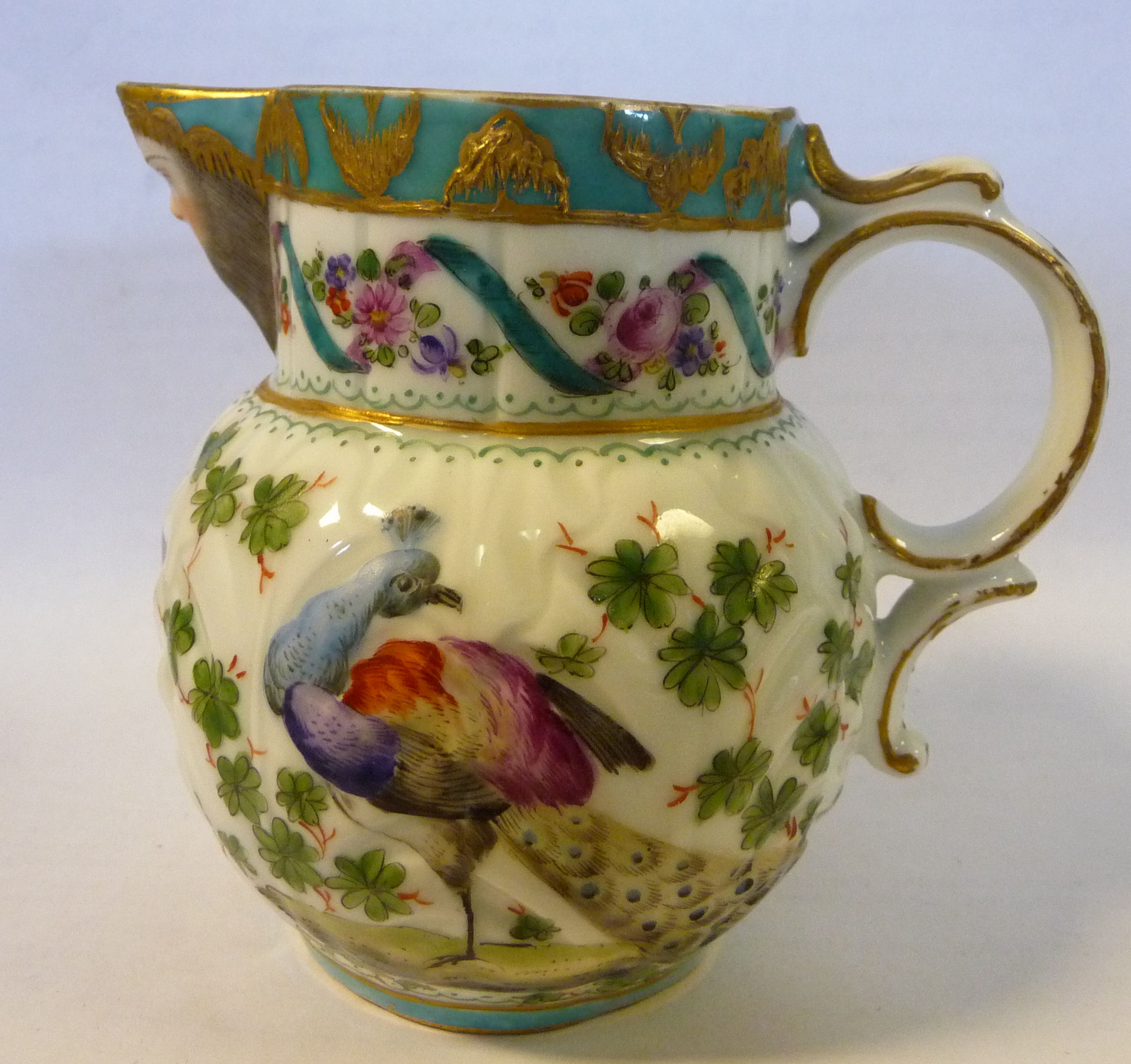 A late 18thC style Continental moulded porcelain jug of bulbous form with a double C-scrolled - Image 2 of 12