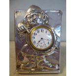 An Edwardian silver mounted oak backplate for a novelty timepiece, featuring a standing Policeman,