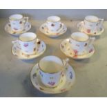 A set of six Derby, Stevenson & Hancock china coffee cans and saucers,