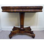 An early 19thC Continental rosewood card table, having a rotating, foldover top,