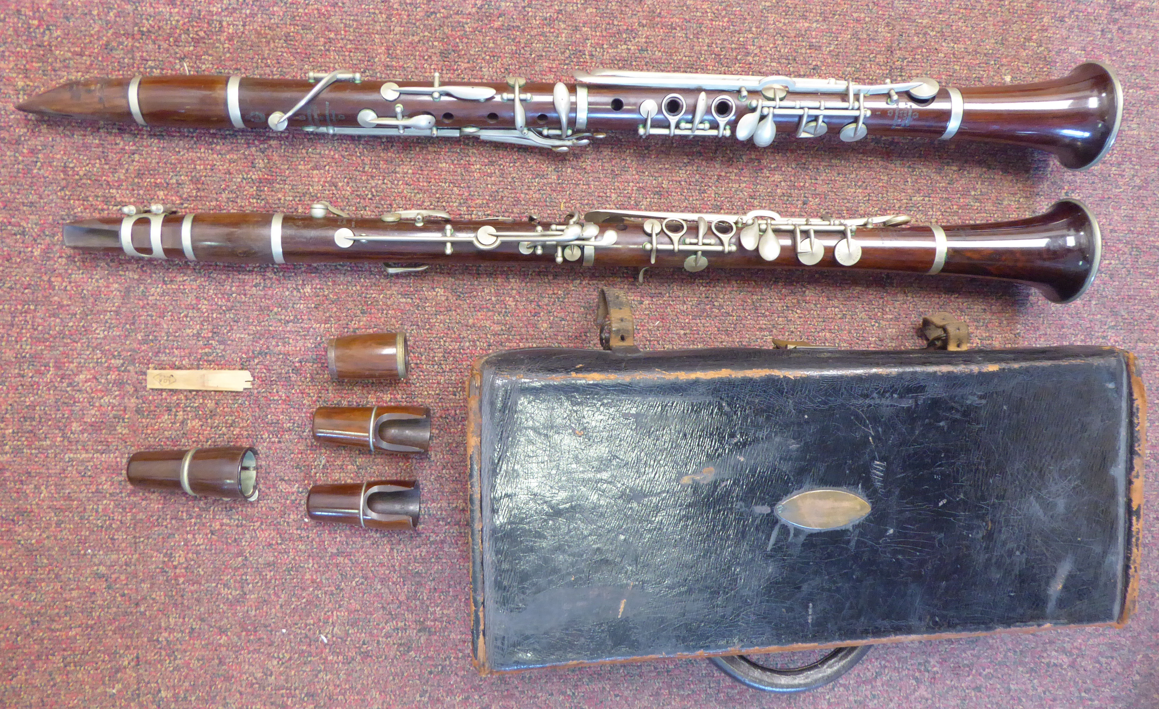 Two similar early 20thC E Albert and BA Chapple fruitwood clarinets with silver plated mounts, - Image 2 of 18