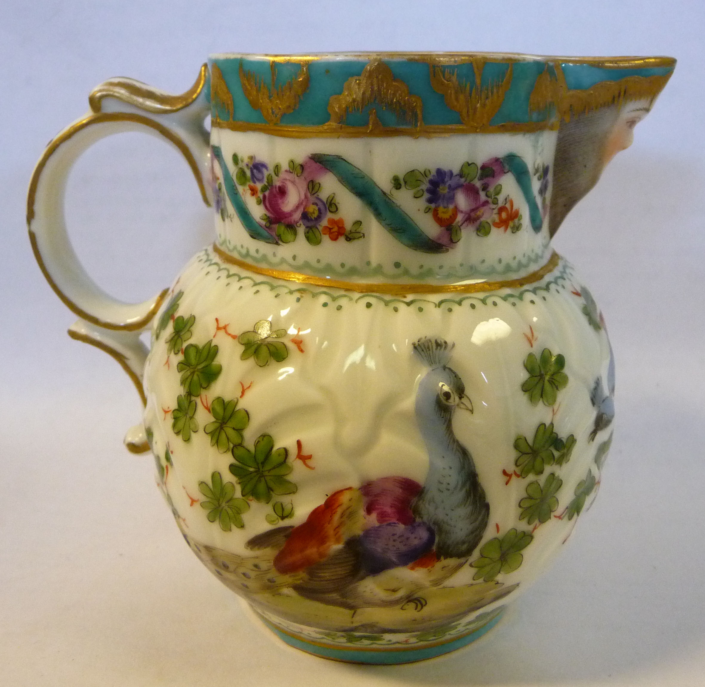 A late 18thC style Continental moulded porcelain jug of bulbous form with a double C-scrolled - Image 8 of 12