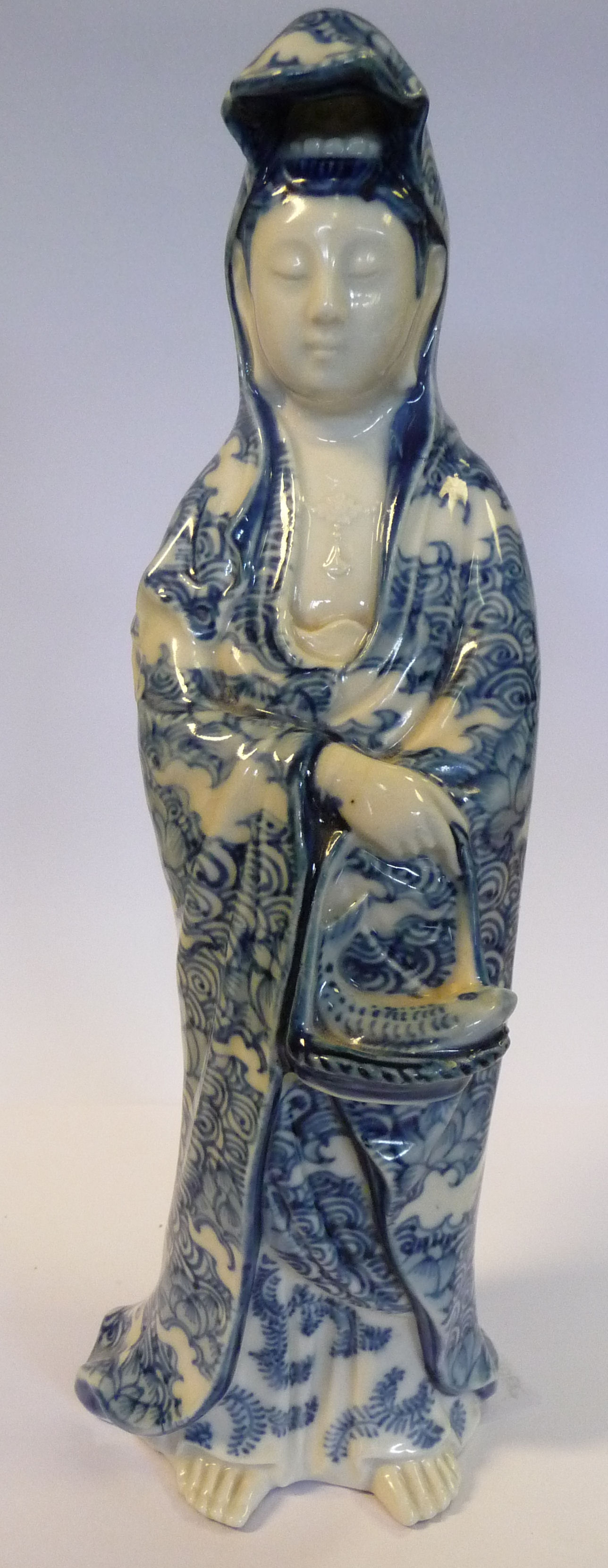 An early 20thC Chinese porcelain standing figure, Guan Yin, holding a basket of fish, - Image 2 of 11