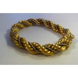 An 18ct bi-coloured gold ropetwist bracelet,