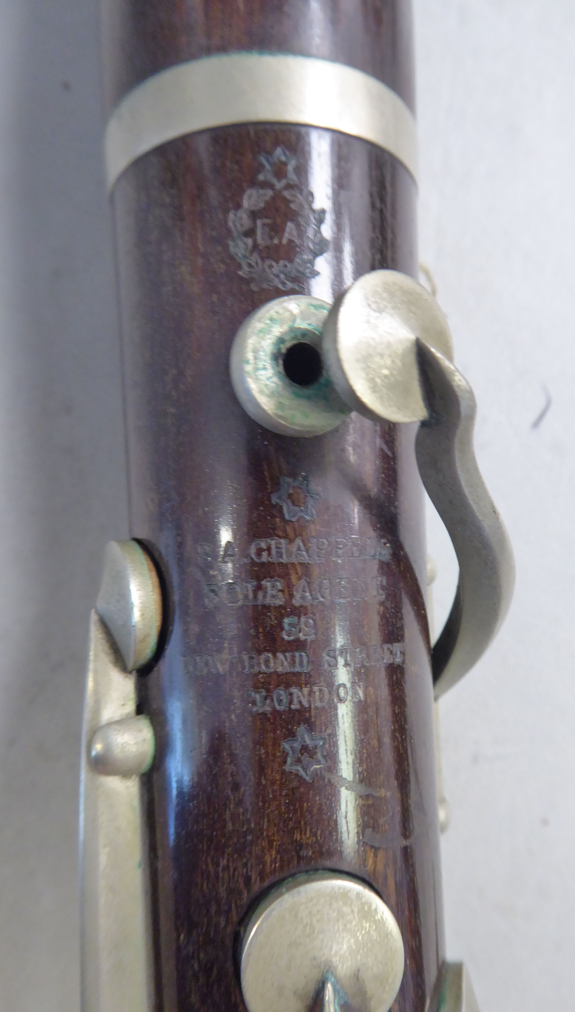 Two similar early 20thC E Albert and BA Chapple fruitwood clarinets with silver plated mounts, - Image 14 of 18