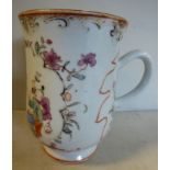 A late 18thC Chinese porcelain tankard of waisted baluster form with a loop handle and flared lip,