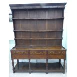A George III and later country made oak dresser,