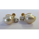 A pair of bi-coloured gold, natural pearl and diamond set,