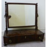 A late Victorian ebony inlaid flame mahogany framed dressing table mirror,