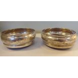 A pair of silver wine coasters with turned mahogany bases Broadway & Co Birmingham 1980 3.