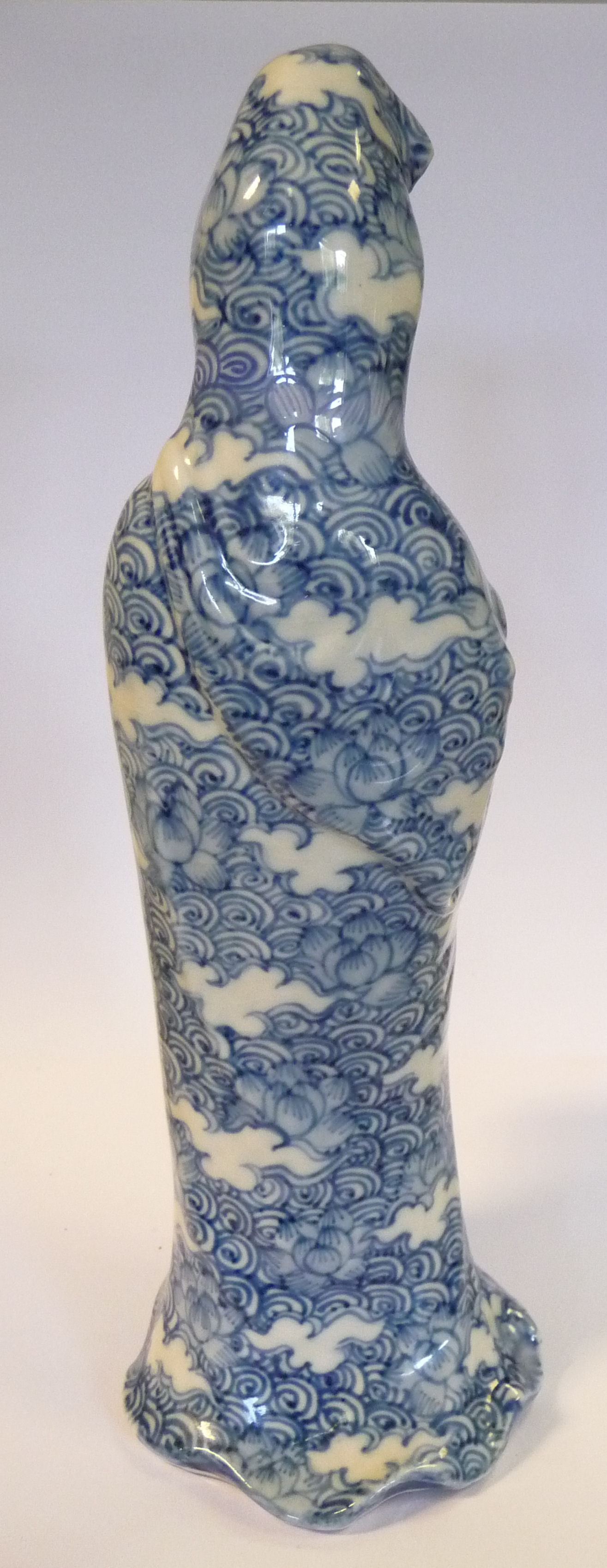 An early 20thC Chinese porcelain standing figure, Guan Yin, holding a basket of fish, - Image 5 of 11