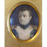 A mid 19thC oval head and shoulders portrait miniature 'Napoleon Bonaparte' in a gilded mount and a