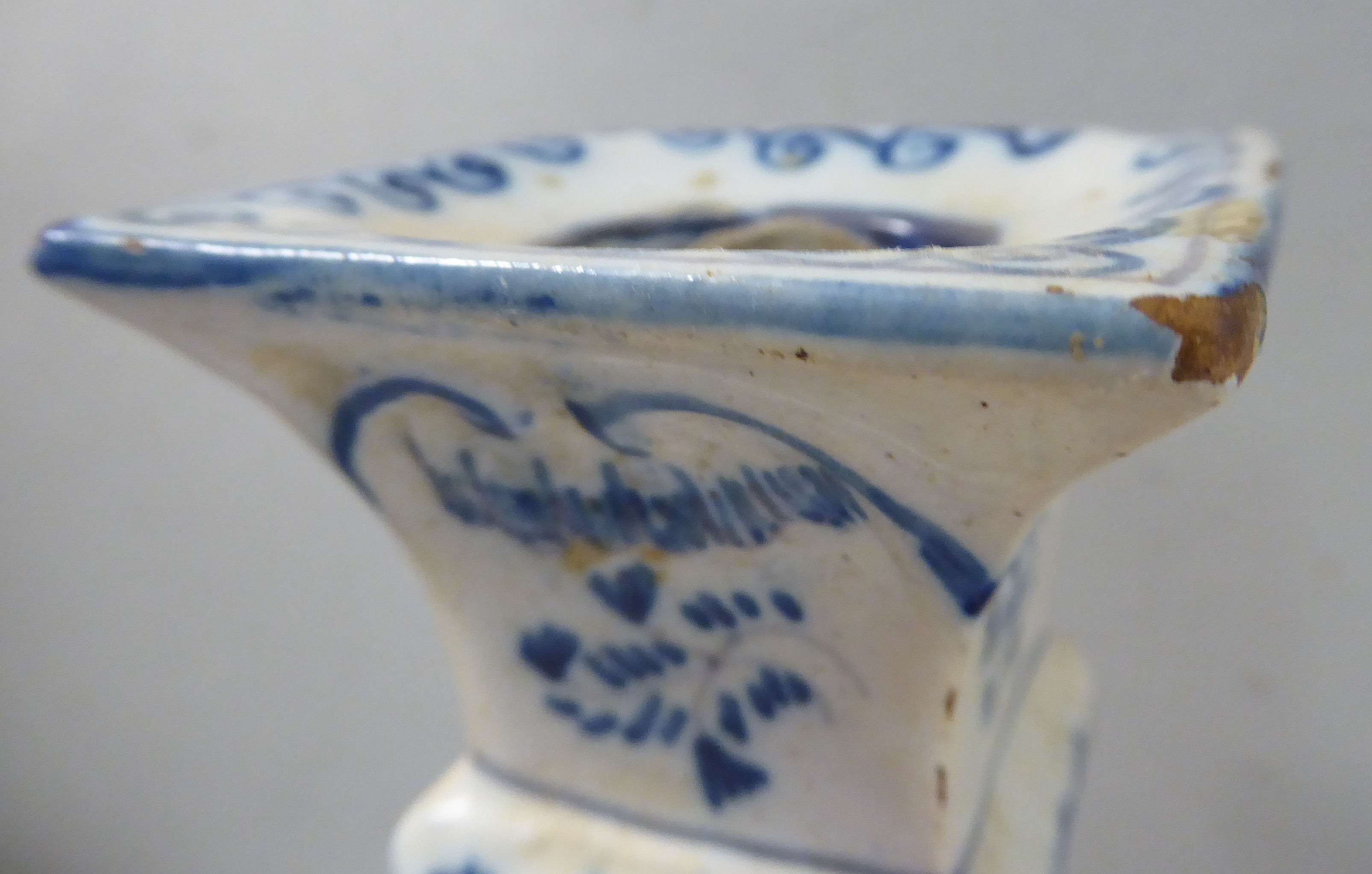 A pair of early Dutch Delft candlesticks, decorated in blue and white with flora and windmills 6. - Image 6 of 14