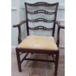 A 20thC reproduction of a Chippendale mahogany framed elbow chair, the moulded,