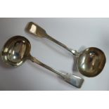 A pair of early Victorian silver fiddle pattern sauce ladles with oval bowls William Fearn London