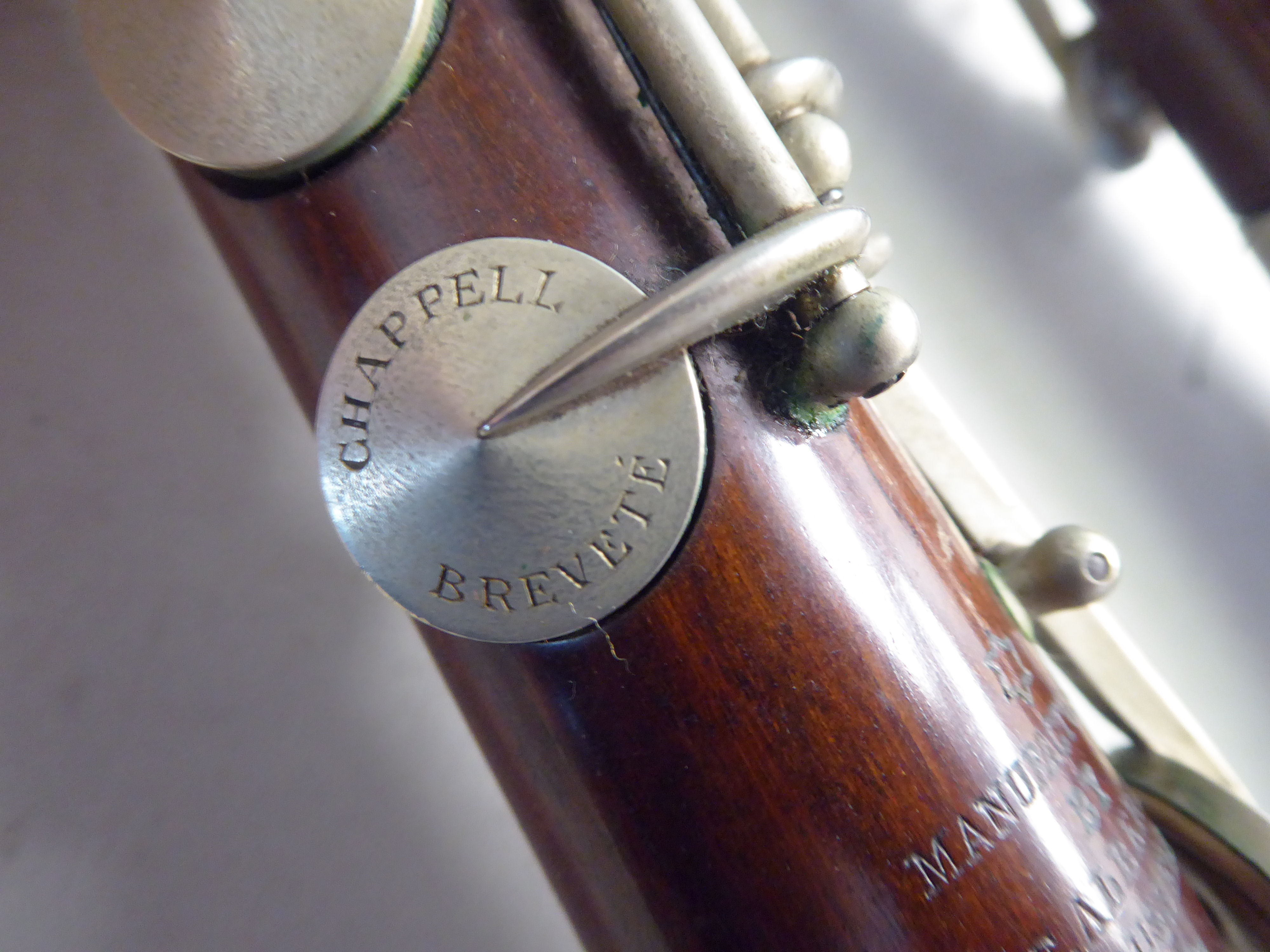 Two similar early 20thC E Albert and BA Chapple fruitwood clarinets with silver plated mounts, - Image 13 of 18
