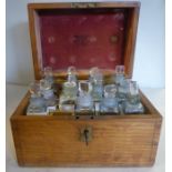 A late Victorian honey coloured oak chemist's chest with straight sides and a lockable,