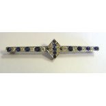 An Art Deco white coloured metal brooch,