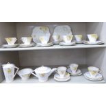 An early 1930s Shelley china Tulip pattern tea set, (No.