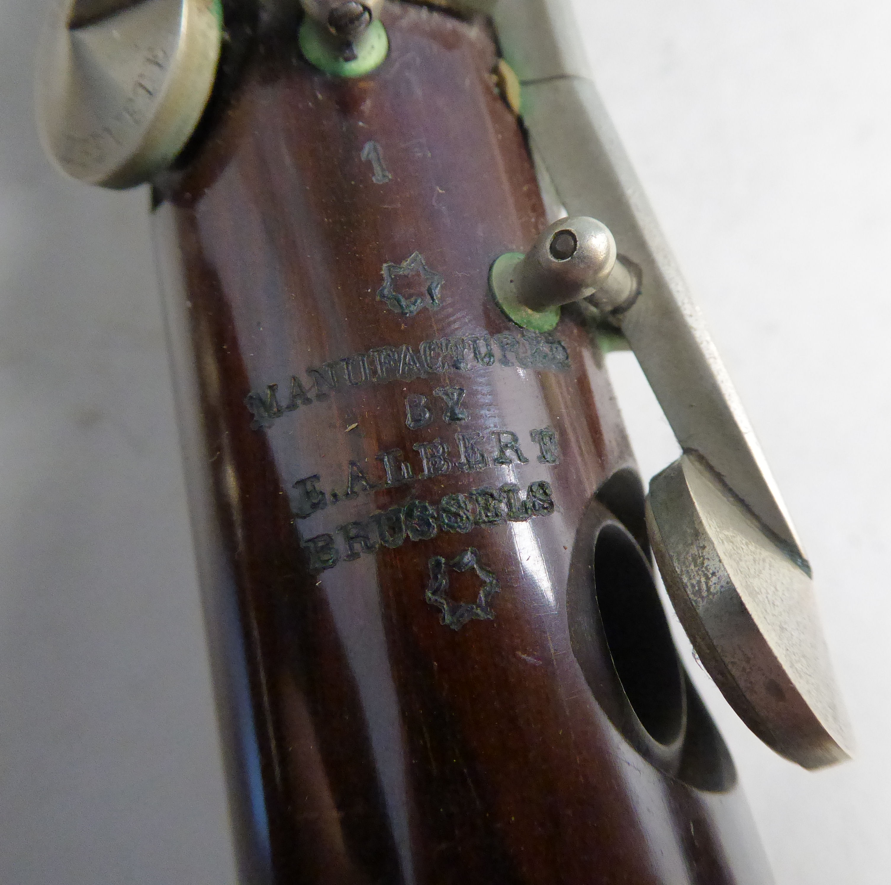 Two similar early 20thC E Albert and BA Chapple fruitwood clarinets with silver plated mounts, - Image 6 of 18