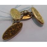 A pair of 9ct gold tablet and chain cufflinks with engraved ornament 11