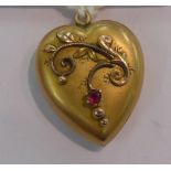 An 'antique' 9ct gold heart shaped,