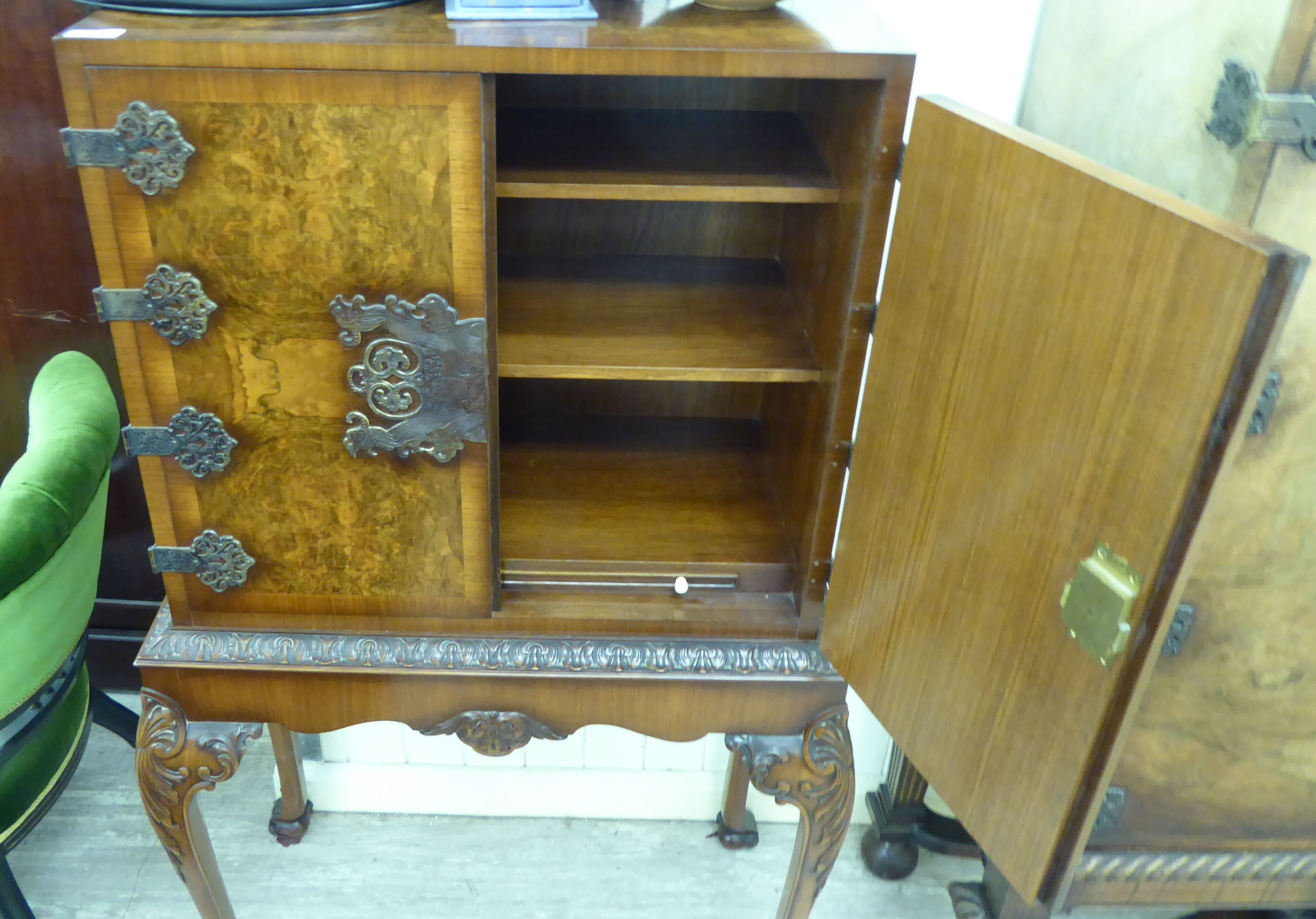 A mid 20thC figured walnut cocktail cabinet, - Image 3 of 3