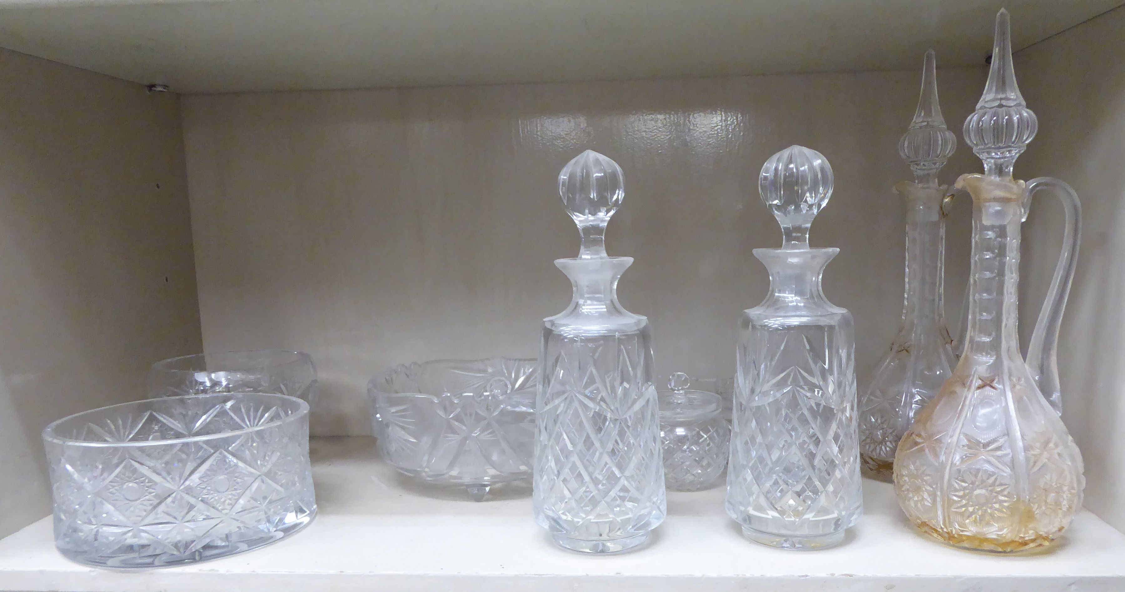 Slice decorated glassware: to include a pair of shouldered crystal decanters with stoppers