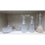 Slice decorated glassware: to include a pair of shouldered crystal decanters with stoppers